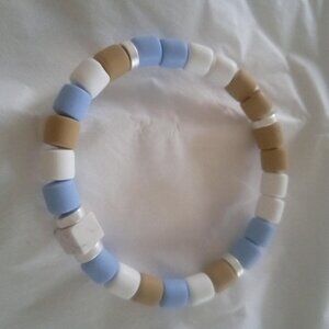 Bracelet...stretch bracelet, mini cube shape center bead, 7" inches